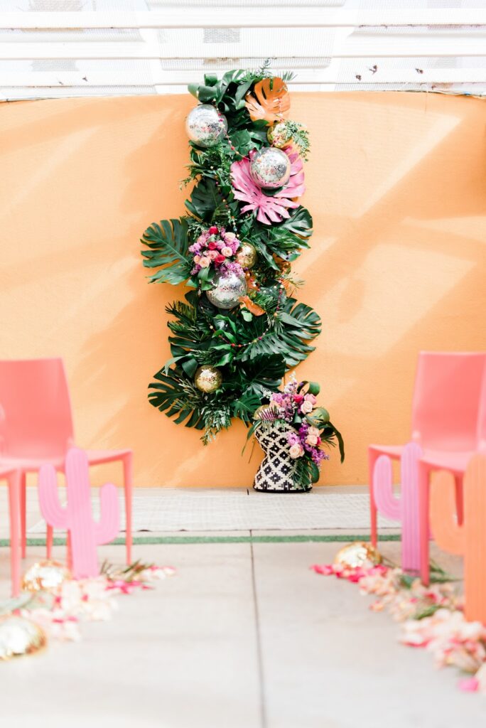 Colorful and tropical desert disco ceremony set up from Arizona Wedding Planners 